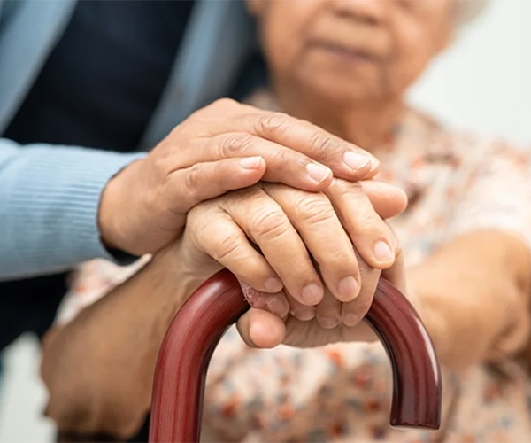 Caring staff with senior resident